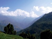 Foothill of Annapurna, cross the valleys seen from Pothana.jpg